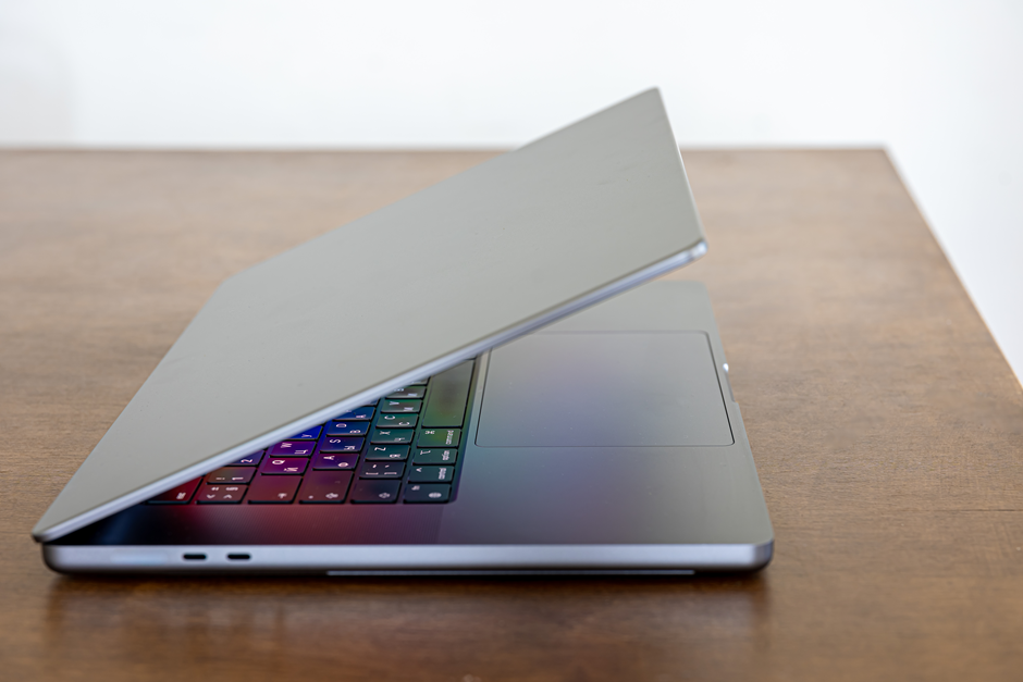 An ASUS Vivbook  placed on a wooden table.