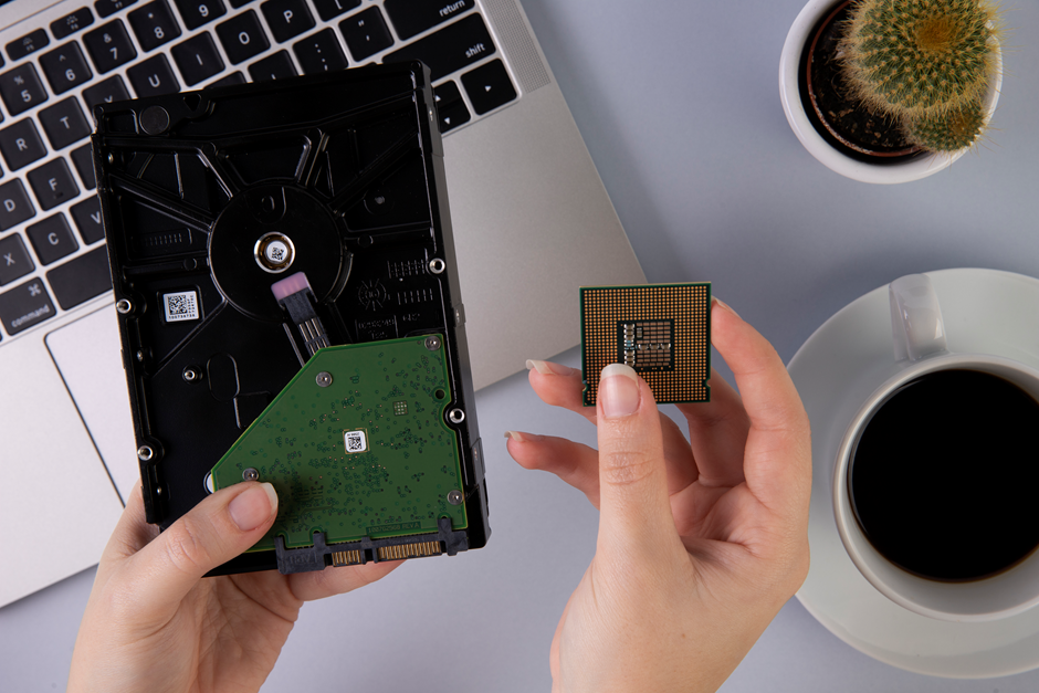 A girl holding hardware- the main component of building gaming laptop.