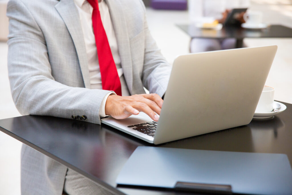 A business man using laptop.